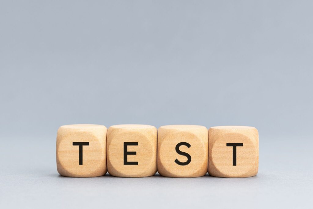 Wooden blocks spell out the word test